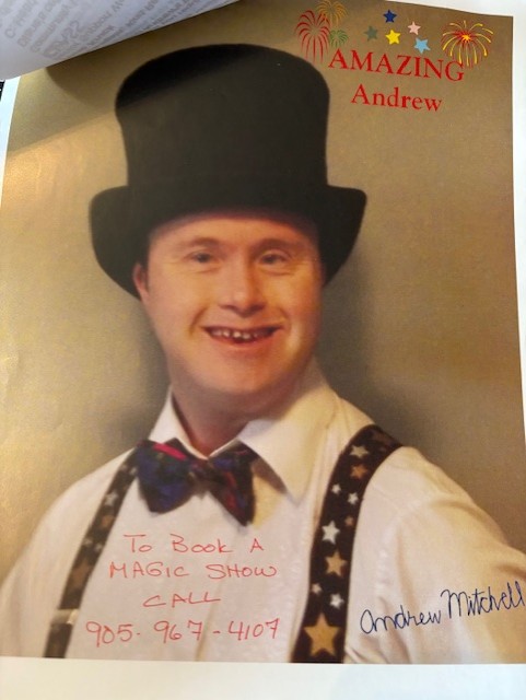 photo of Andrew the magician wearing his top hat bow and suspenders