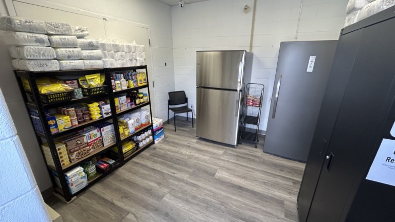 Photo shows the community fridge open daily at 125 Dufferin St for people in need