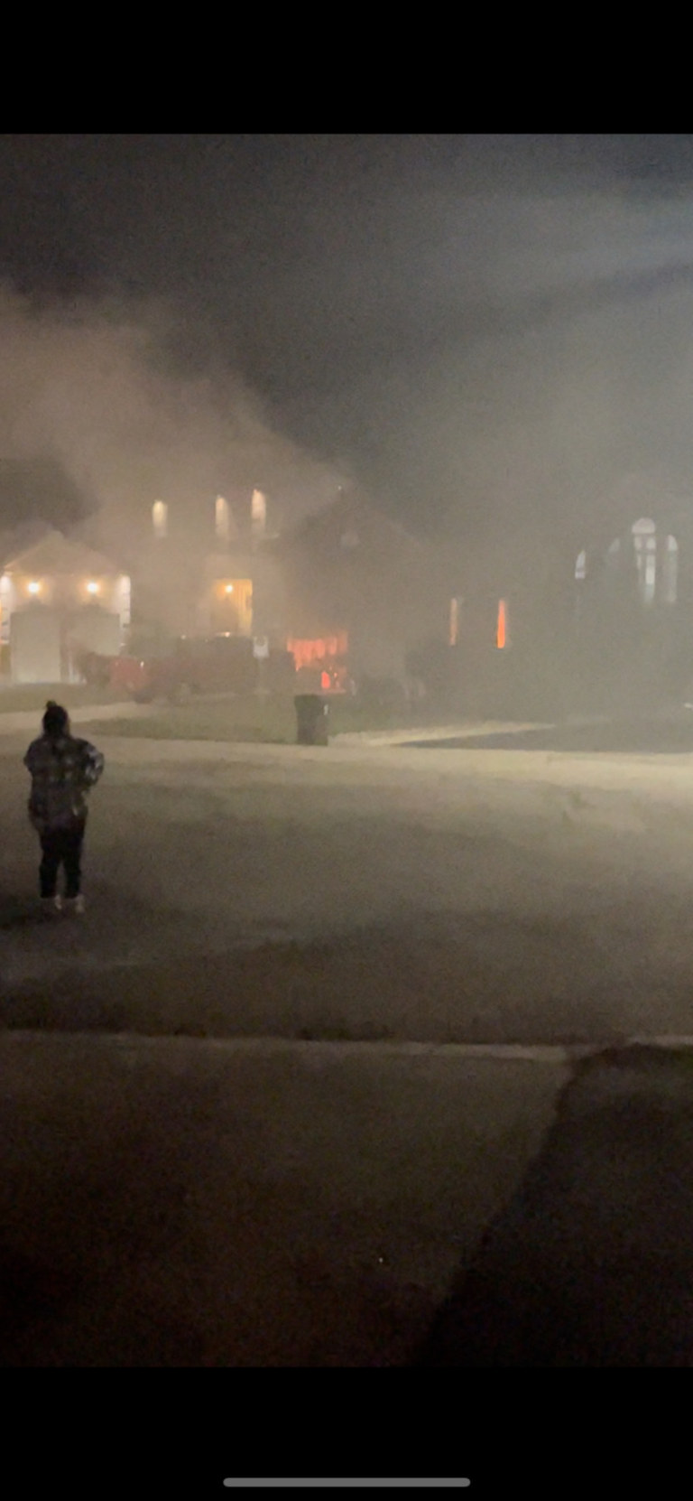 photo of fire department putting out fire on Mills Court in Bradford
