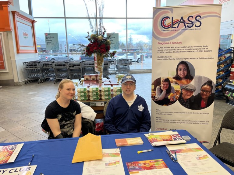 people supported from CLASS helping to sell Rotary Lottery Ticket calendars at Zehrs in Alliston